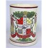Image 1 : A late 18th century creamware mug printed in black and overpainted with a pseudo armorial supported.