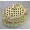 Image 1 : A late 18th century creamware chestnut basket, cover and stand, possibly Leeds, the tapering oval s.