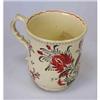 Image 1 : A late 18th century creamware coffee cup, possibly Leeds, painted in red and black below the beaded.