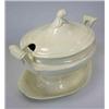 Image 1 : An early 19th century Dawson creamware sauce tureen and cover, two scroll handles raised above the r