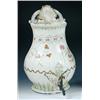 Image 1 : An early 19th century creamware wine cistern, the half baluster shape with shell and scrolls raised.