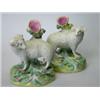 Image 1 : A pair of late 19th century Staffordshire sheep spill vases, the ram and ewe standing over streams..