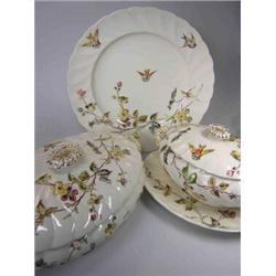 A late 19th century Powell, Bishop and Stonier dinner service, each piece printed in brown and over.