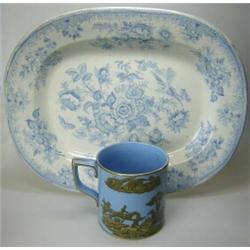 A Victorian majolica beer jug moulded and painted with father on one side and mother on the other e.