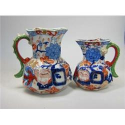 Two early 19th century Mason's ironstone jugs, the octagonal baluster shapes painted in Imari palet.