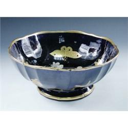 A 'Mason's Patent Ironstone China' bowl, the fluted sides gilt and painted with butterflies within..