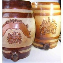 A Victorian Doulton and Watts saltglaze barrel applied with Royal arms above the spigot hole and be.