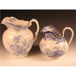 A Victorian Minton blue and white jug printed with Swiss chalets and churches about lakes, printed m