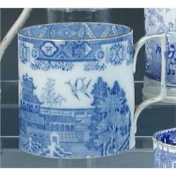 A late 18th century pearlware blue and white quart mug, possibly Spode, the cylindrical sides print.