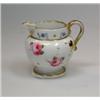 Image 1 : A Chamberlain's Worcester miniature jug, the baluster body painted with pansies and pink roses belo.