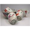 Image 1 : Four 18th century coffee cups, possibly Lowestoft, each painted with flowers, iron red scrolling ab.