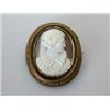 Image 1 : A shell cameo carved with an Elizabethan woman in profile, oval, contained in a cannetille decorate.