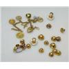 Image 1 : A mixed lot of gold jewellery including a novelty charm bracelet and an assortment of collar studs £