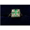 Image 1 : An Emerald and diamond ring with square setting containing five emeralds in a cross within a surrou.