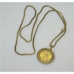 An Austrian gold ducat, 1915, contained in a circular pendant loose mount on a box link neck chain £