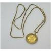 Image 1 : An Austrian gold ducat, 1915, contained in a circular pendant loose mount on a box link neck chain £