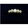 Image 1 : An 18ct gold ring with platinum setting containing five graduated old cut diamonds  £300-350...
