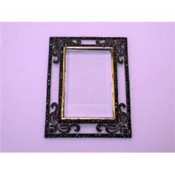 A Victorian gilt metal photograph frame of rectangular shape, the open scrolled frame encrusted wit.
