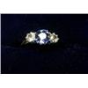 Image 1 : An 18ct gold ring with platinum setting with a sapphire and two diamonds  £230-260...