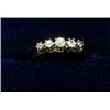 Image 1 : An 18ct gold ring with platinum setting containing five graduated diamonds  £80-120...