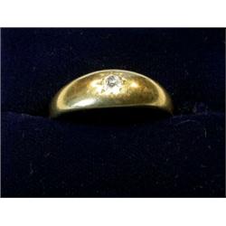 An 18ct gold Gypsy set ring with single old cut diamond  £80-120...