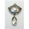 Image 1 : A 19th century pendant with oval pearl centre within a surround of rose cut diamonds with diamond s.