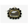 Image 1 : An early 19th century rectangular mourning brooch with black stone surround, 22mm  £40-60...