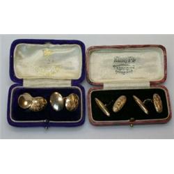 A pair of 9ct gold cufflinks with oval panels, monogrammed, cased, and another pair of 9ct gold cuf.