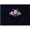 Image 1 : An 18ct gold ring set with an amethyst each shoulder set with three small diamonds  £130-150...