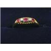 Image 1 : An 18ct gold five stone ring set with rubies and diamonds   £80-120...