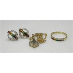 A 14ct gold circular gem set pendant, 28mm, on a fine 14ct gold neck chain, together with the match.