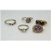 Image 1 : A 9ct gold three stone garnet ring, three other gem set rings and an oval amethyst and seed pearl b.
