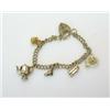 Image 1 : A 9ct gold wire curblink bracelet with padlock clasp suspended with five novelty charms  £70-100...