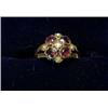 Image 1 : A dress ring set with a garnet and pearl cluster £100-200...