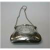 Image 1 : A silver evening purse, maker T&S, Chester 1919, of bombe shape bright cut engraved with arabesques.