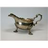 Image 1 : A George II silver sauce boat by Fuller White, London 1751, of plain oval form below a cut edge rais