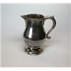 Image 1 : A George II silver milk jug by John Eckfourd Junior, London 1732, of plain baluster shape, raised o.