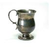 Image 1 : A small Edwardian silver christening mug by Browetts, Birmingham 1908, of plain baluster form raise.