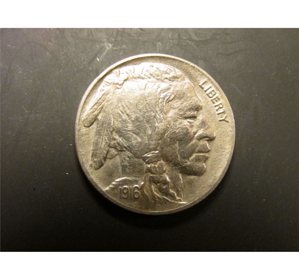 1916 P Buffalo Nickel. AU 58. Red Book value 25.00.