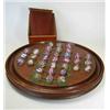 Image 1 : A mahogany solitaire board with Venetian glass marble pieces, the latter with spiral lace and colou.