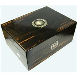 A mid 19th century calamander wood dressing box, the rectangular lid inlaid with mother of pearl es.