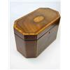 Image 1 : A George III mahogany tea caddy, the canted rectangular lid satinwood cross banded about central ova