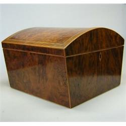 An early 19th century yew wood work box, the round arched rectangular lid with band of line inlay, t