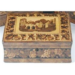 A mid 19th century Tunbridge ware work box, the rectangular lid with rounded band of flowers outsid.
