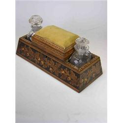 A mid 19th century Tunbridge ware necessaire, the floral banded sides tapering to the central pincu.