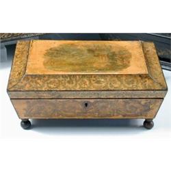 An early 19th century penwork box, the rectangular lid of the sarcophagus shape decorated with a Go.