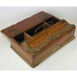 A mid 19th century walnut writing box, the twin pen trough top opening about the central carrying h.