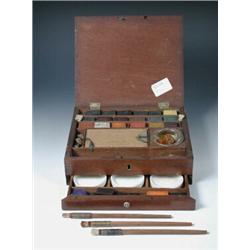 An early Victorian mahogany paint box containing crested cakes of paint by Reeves and Woodyer, Newma