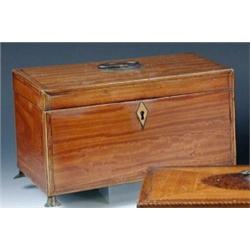 A George III satinwood tea caddy, the rectangular top with central oval ring handle within crossband