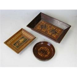 Three Tunbridge ware trays, one worked with two rosettes within flared rosewood rectangular sides, 1